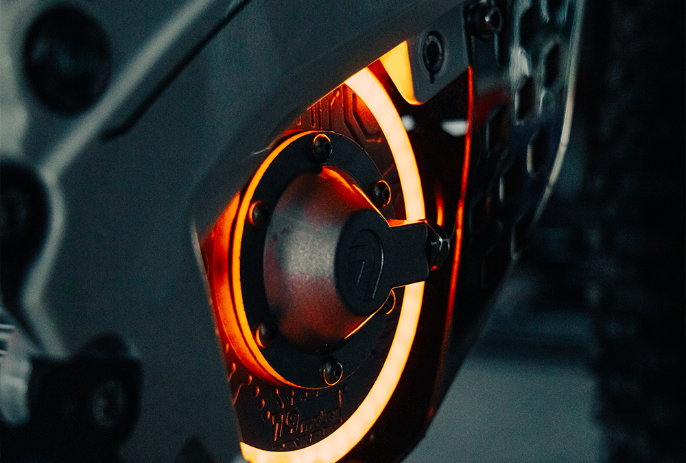 79BIKE Falcon GT mid-drive motor with the rotor lit