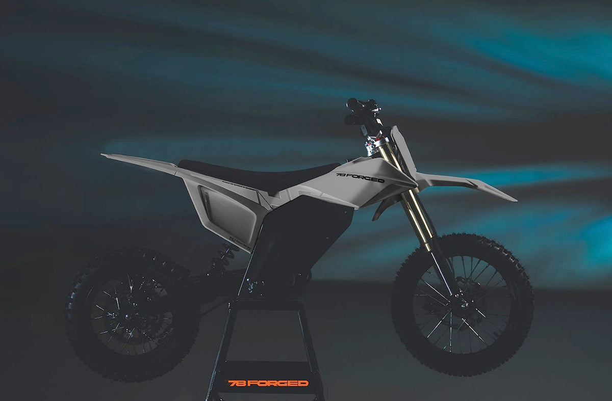 78 Forged Phase I electric dirt bike in Sierra grey, drive side
