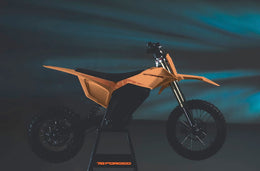 78 Forged Phase I electric dirt bike in Sunset orange, drive side
