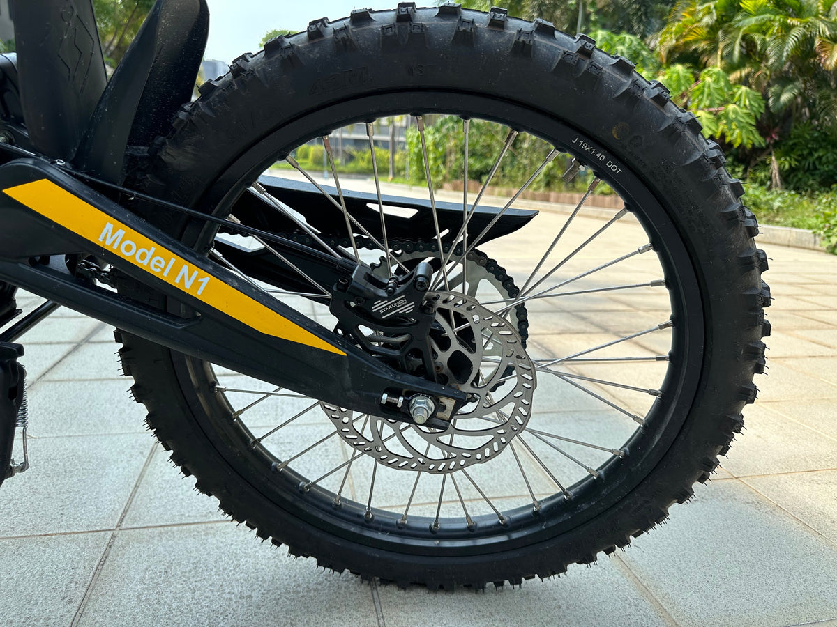 Natkie N1 rear wheel, swingarm and disc brake detail