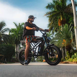 Rider on a Freego Shotgun Prime F2 Pro on a coastal road