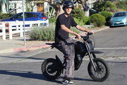 Rider aboard the Riding'times GT54 Pro at a crosswalk