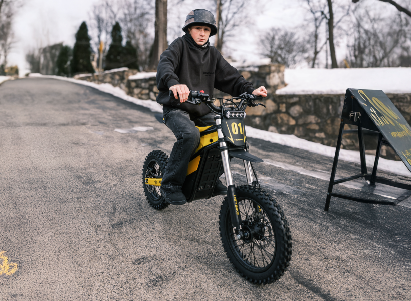 Heybike Villain electric dirt bike being ridden off-road