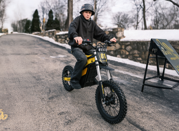 Heybike Villain electric dirt bike being ridden off-road