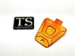 CNC Aluminum Horn Delete Cover — E-Ride Pro & Surron · Titanium Surron, burnt orange
