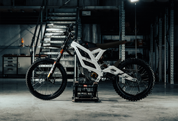 79BIKE Falcon GT in white, side profile in a workshop