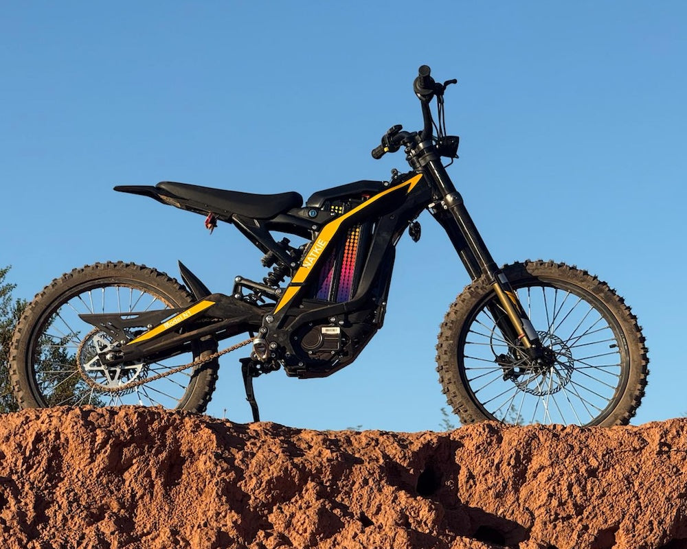 Natkie N1 on a red dirt bank against a blue sky