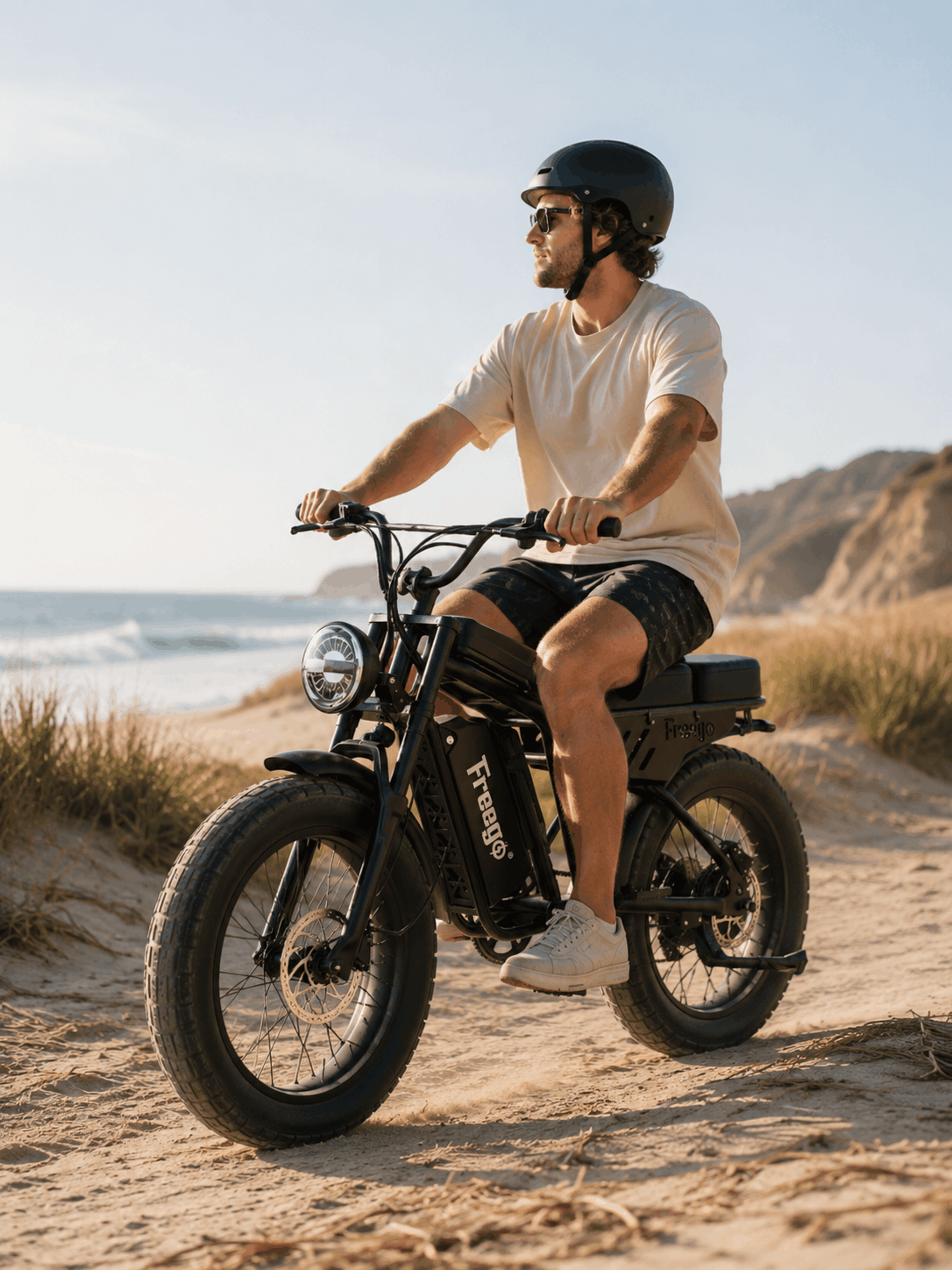 Rider on a Freego Shotgun Lite F0 beside the ocean