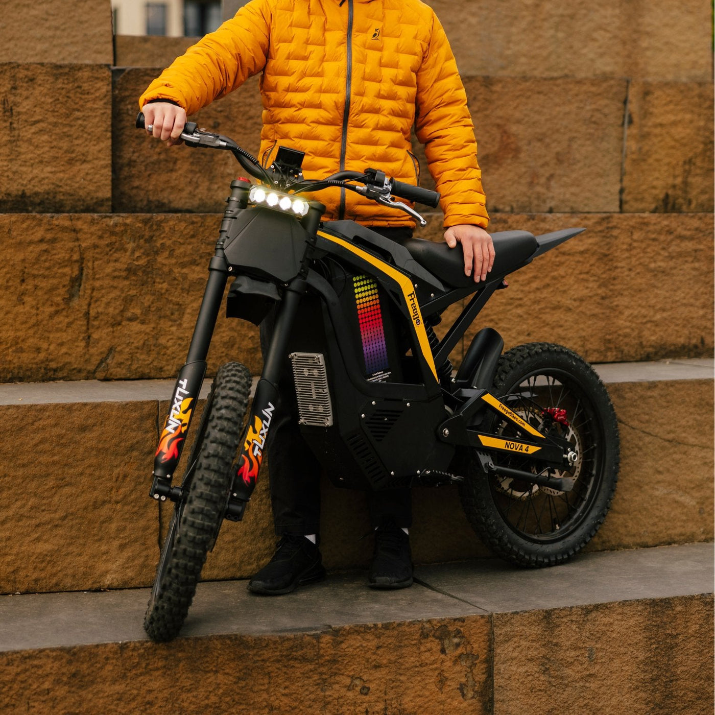 Freego Nova 4 leaning against a sandstone wall