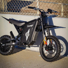 Freego X0 parked against a wall, front three-quarter view