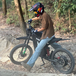 Freego X3 parked on a wooded trail