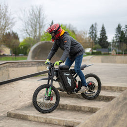 Rider in a full-face helmet on a Freego X3 Pro at a skatepark