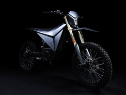 Y-VOLT Surge V in Black, front three-quarter on the stand