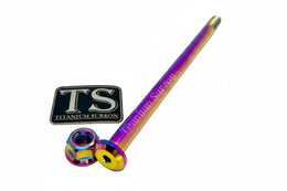 Titanium Rear Axle and Nut - Yozma IN10 · Titanium Surron, rainbow
